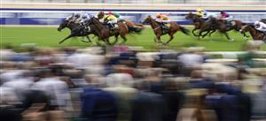 ASCOT, ENGLAND - JULY 23: Daniel Tudhope riding Fresh (L, grey) win The Moet & Chandon International Stakes at Ascot Racecourse on July 23, 2022 in Ascot, England. (Photo by Alan Crowhurst/Getty Images)
