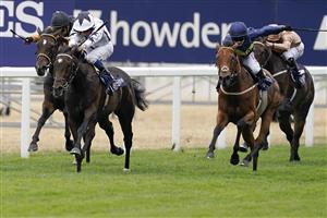 ASCOT, ENGLAND - JULY 23: Hollie Doyle riding Jumbly (R, blue) win The Longines Valiant Stakes at Ascot Racecourse on July 23, 2022 in Ascot, England. (Photo by Alan Crowhurst/Getty Images)