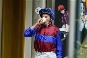 ASCOT, ENGLAND - JULY 23: Ryan Moore enjoys a drink before the first race at Ascot Racecourse on July 23, 2022 in Ascot, England. (Photo by Alan Crowhurst/Getty Images)