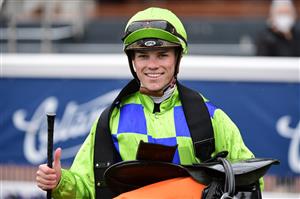 MELBOURNE, AUSTRALIA - JULY 23: Will Price riding Thron Bone afterwinning Race 1, the Mrc Membership Renewal Handicap, during Melbourne Racing at Caulfield Racecourse on July 23, 2022 in Melbourne, Australia. (Photo by Vince Caligiuri/Getty Images)