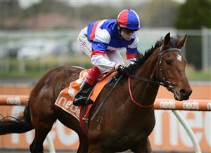 MELBOURNE, AUSTRALIA - JULY 23: Craig Williams riding Sing for Peace winning Race 4, the Mrc Chairmans Club Handicap, during Melbourne Racing at Caulfield Racecourse on July 23, 2022 in Melbourne, Australia. (Photo by Vince Caligiuri/Getty Images)