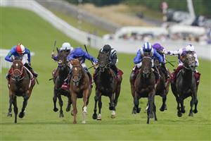 CHICHESTER, ENGLAND - JULY 27: Jim Crowley riding Baaeed (blue/white) win The Qatar Sussex Stakes during day two of the Qatar Goodwood Festival at Goodwood Racecourse on July 27, 2022 in Chichester, England. (Photo by Alan Crowhurst/Getty Images)