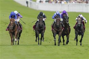 CHICHESTER, ENGLAND - JULY 27: Jim Crowley riding Baaeed (blue/white) win The Qatar Sussex Stakes during day two of the Qatar Goodwood Festival at Goodwood Racecourse on July 27, 2022 in Chichester, England. (Photo by Alan Crowhurst/Getty Images)