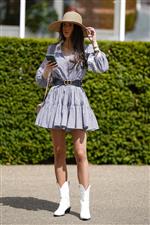 CHICHESTER, ENGLAND - JULY 27: Fashion during day two of the Qatar Goodwood Festival at Goodwood Racecourse on July 27, 2022 in Chichester, England. (Photo by Alan Crowhurst/Getty Images)
