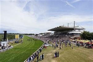 CHICHESTER, ENGLAND - JULY 27: William Buick riding Secret State (2R, blue) ease down after winning The Coral Beaten-By-A-Length Free Bet Handicap during day two of the Qatar Goodwood Festival at Goodwood Racecourse on July 27, 2022 in Chichester, England. (Photo by Alan Crowhurst/Getty Images)