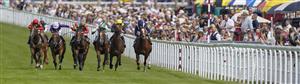 CHICHESTER, ENGLAND - JULY 28: Jim Crowley riding Royal Scotsman (C, pink/green) win The Richmond Stakes during day three of the Qatar Goodwood Festival at Goodwood Racecourse on July 28, 2022 in Chichester, England. (Photo by Alan Crowhurst/Getty Images)