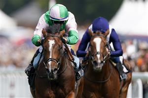 CHICHESTER, ENGLAND - JULY 28: Jim Crowley riding Royal Scotsman (pink/green) win The Richmond Stakes during day three of the Qatar Goodwood Festival at Goodwood Racecourse on July 28, 2022 in Chichester, England. (Photo by Alan Crowhurst/Getty Images)