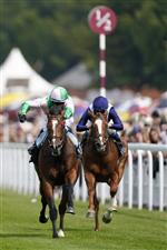 CHICHESTER, ENGLAND - JULY 28: Jim Crowley riding Royal Scotsman (pink/green) win The Richmond Stakes during day three of the Qatar Goodwood Festival at Goodwood Racecourse on July 28, 2022 in Chichester, England. (Photo by Alan Crowhurst/Getty Images)