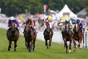 CHICHESTER, ENGLAND - JULY 28: Jim Crowley riding Royal Scotsman (pink/green) win The Richmond Stakes during day three of the Qatar Goodwood Festival at Goodwood Racecourse on July 28, 2022 in Chichester, England. (Photo by Alan Crowhurst/Getty Images)