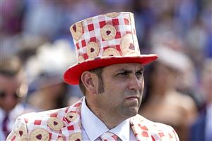 CHICHESTER, ENGLAND - JULY 28: Taking the biscuit during day three of the Qatar Goodwood Festival at Goodwood Racecourse on July 28, 2022 in Chichester, England. (Photo by Alan Crowhurst/Getty Images)