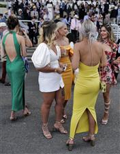 CHICHESTER, ENGLAND - JULY 28: Young racegoer during day three of the Qatar Goodwood Festival at Goodwood Racecourse on July 28, 2022 in Chichester, England. (Photo by Alan Crowhurst/Getty Images)
