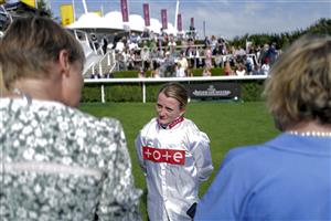 CHICHESTER, ENGLAND - JULY 28: Hollie Doyle chats with the press during day three of the Qatar Goodwood Festival at Goodwood Racecourse on July 28, 2022 in Chichester, England. (Photo by Alan Crowhurst/Getty Images)