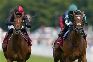 CHICHESTER, ENGLAND - JULY 28: Hollie Doyle riding Nashwa (green) win The Qatar Nassau Stakes during day three of the Qatar Goodwood Festival at Goodwood Racecourse on July 28, 2022 in Chichester, England. (Photo by Alan Crowhurst/Getty Images)