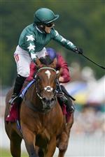 CHICHESTER, ENGLAND - JULY 28: Hollie Doyle riding Nashwa (green) win The Qatar Nassau Stakes during day three of the Qatar Goodwood Festival at Goodwood Racecourse on July 28, 2022 in Chichester, England. (Photo by Alan Crowhurst/Getty Images)