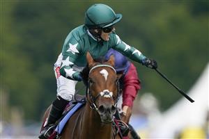 CHICHESTER, ENGLAND - JULY 28: Hollie Doyle riding Nashwa (green) win The Qatar Nassau Stakes during day three of the Qatar Goodwood Festival at Goodwood Racecourse on July 28, 2022 in Chichester, England. (Photo by Alan Crowhurst/Getty Images)