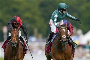 CHICHESTER, ENGLAND - JULY 28: Hollie Doyle riding Nashwa (green) win The Qatar Nassau Stakes during day three of the Qatar Goodwood Festival at Goodwood Racecourse on July 28, 2022 in Chichester, England. (Photo by Alan Crowhurst/Getty Images)
