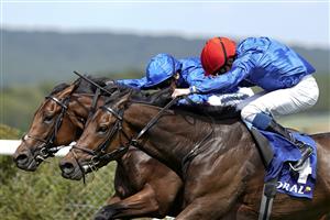CHICHESTER, ENGLAND - JULY 28: William Buick riding Warren Point (red cap) win The Coral Kincsem Handicap during day three of the Qatar Goodwood Festival at Goodwood Racecourse on July 28, 2022 in Chichester, England. (Photo by Alan Crowhurst/Getty Images)