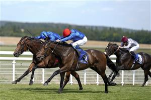 CHICHESTER, ENGLAND - JULY 28: William Buick riding Warren Point (red cap) win The Coral Kincsem Handicap during day three of the Qatar Goodwood Festival at Goodwood Racecourse on July 28, 2022 in Chichester, England. (Photo by Alan Crowhurst/Getty Images)