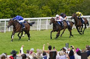 CHICHESTER, ENGLAND - JULY 28: William Buick riding New London (blue) win The John Pearce Racing Gordon Stakes during day three of the Qatar Goodwood Festival at Goodwood Racecourse on July 28, 2022 in Chichester, England. (Photo by Alan Crowhurst/Getty Images)