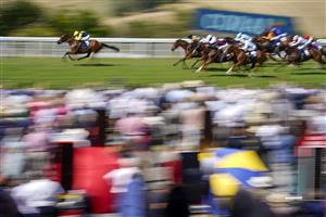 CHICHESTER, ENGLAND - JULY 29: Jason Watson riding Orbaan win The Coral Golden Mile Handicap during day four of the Qatar Goodwood Festival at Goodwood Racecourse on July 29, 2022 in Chichester, England. (Photo by Alan Crowhurst/Getty Images)