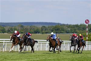 CHICHESTER, ENGLAND - JULY 29: Tom Marquand riding Rocchigiani (L, red/blue cap) win The Bonhams Thoroughbred Stakes during day four of the Qatar Goodwood Festival at Goodwood Racecourse on July 29, 2022 in Chichester, England. (Photo by Alan Crowhurst/Getty Images)