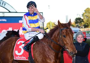 MELBOURNE, AUSTRALIA - JULY 30: Billy Egan riding Jimmy The Bear after winning Race 7, the Ladbrokes Handicap, during Melbourne Racing at Moonee Valley Racecourse on July 30, 2022 in Melbourne, Australia. (Photo by Vince Caligiuri/Getty Images)
