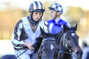 SYDNEY, AUSTRALIA - JULY 30: Jean Van Overmeire on Cross talk returns to scale after winning race 8 the Atc Foundation Winter Challenge during Sydney Racing at Rosehill Gardens on July 30, 2022 in Sydney, Australia. (Photo by Mark Evans/Getty Images)