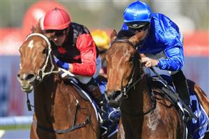SYDNEY, AUSTRALIA - JULY 30: Reece Jones (blue) on Troach wins race 2 the Precise Air Handicap during Sydney Racing at Rosehill Gardens on July 30, 2022 in Sydney, Australia. (Photo by Mark Evans/Getty Images)