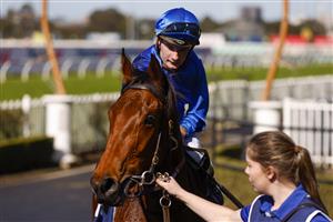 SYDNEY, AUSTRALIA - JULY 30: Reece Jones on Troach returns to scale after winning race 2 the Precise Air Handicap during Sydney Racing at Rosehill Gardens on July 30, 2022 in Sydney, Australia. (Photo by Mark Evans/Getty Images)