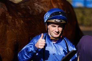 SYDNEY, AUSTRALIA - JULY 30: Reece Jones gives the thumbs up after winning race 2 the Precise Air Handicap on Troach during Sydney Racing at Rosehill Gardens on July 30, 2022 in Sydney, Australia. (Photo by Mark Evans/Getty Images)