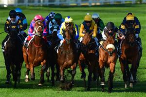 MELBOURNE, AUSTRALIA - JULY 30: Craig Williams riding Ferago (pink cap) winning Race 5, the Easy Foam Hand Wash Handicap, during Melbourne Racing at Moonee Valley Racecourse on July 30, 2022 in Melbourne, Australia. (Photo by Vince Caligiuri/Getty Images)