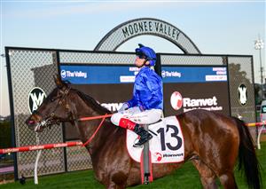 MELBOURNE, AUSTRALIA - JULY 30: Craig Williams riding Lackeen afterwinning Race 8, the Ranvet Travis Harrison Cup, during Melbourne Racing at Moonee Valley Racecourse on July 30, 2022 in Melbourne, Australia. (Photo by Vince Caligiuri/Getty Images)