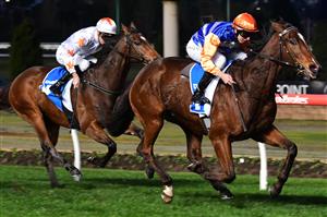 MELBOURNE, AUSTRALIA - JULY 30: Damian Lane riding Home Rule winning Race 9, the Dominant.com.au Handicap, during Melbourne Racing at Moonee Valley Racecourse on July 30, 2022 in Melbourne, Australia. (Photo by Vince Caligiuri/Getty Images)