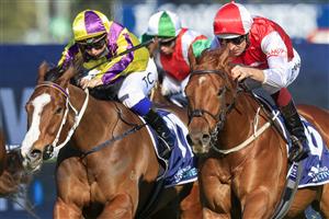 SYDNEY, AUSTRALIA - JULY 30: Hugh Bowman (red and white) on Pizarro wins race 6 the Atc Thank You Stable Staff Handicap during Sydney Racing at Rosehill Gardens on July 30, 2022 in Sydney, Australia. (Photo by Mark Evans/Getty Images)
