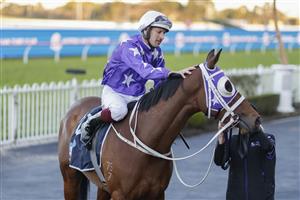 SYDNEY, AUSTRALIA - JULY 30: Hugh Bowman on Sur La Mer returns to scale after winning race 10 the Atc Thank You Trainers Handicap during Sydney Racing at Rosehill Gardens on July 30, 2022 in Sydney, Australia. (Photo by Mark Evans/Getty Images)