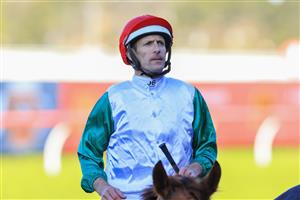 SYDNEY, AUSTRALIA - JULY 30: Hugh Bowman on Wicklow returns to scale after winning race 7 the Special Achievement Shelby Sixtysix during Sydney Racing at Rosehill Gardens on July 30, 2022 in Sydney, Australia. (Photo by Mark Evans/Getty Images)