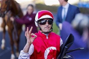 SYDNEY, AUSTRALIA - JULY 30: Hugh Bowman smiles SYDNEY, AUSTRALIA - JULY 30: Hugh Bowman smiles after winning race 6 the Atc Thank You Stable Staff Handicap on Pizarro during Sydney Racing at Rosehill Gardens on July 30, 2022 in Sydney, Australia. (Photo by Mark Evans/Getty Images)