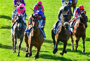 MELBOURNE, AUSTRALIA - JULY 30: Jake Noonan riding Shock 'Em Ova winning Race 4, Dominant Plant Powered Cleaning Handicap, during Melbourne Racing at Moonee Valley Racecourse on July 30, 2022 in Melbourne, Australia. (Photo by Vince Caligiuri/Getty Images)