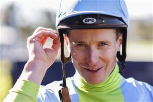 SYDNEY, AUSTRALIA - JULY 30: James McDonald smiles after winning race 5 the Nswroa Trophy Shades Of Rose during Sydney Racing at Rosehill Gardens on July 30, 2022 in Sydney, Australia. (Photo by Mark Evans/Getty Images)
