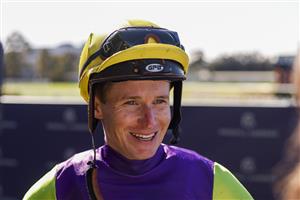 SYDNEY, AUSTRALIA - JULY 30: James McDonald smiles after winning race 1 the Tab Highway Handicap on on Molly Nails during Sydney Racing at Rosehill Gardens on July 30, 2022 in Sydney, Australia. (Photo by Mark Evans/Getty Images)