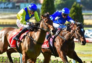 MELBOURNE, AUSTRALIA - JULY 30: Michael Dee riding Winnertakesitall defeats Jamie Kah riding Bistro in Race 3, the Ladbrokes Mates Mode Handicap, during Melbourne Racing at Moonee Valley Racecourse on July 30, 2022 in Melbourne, Australia. (Photo by Vince Caligiuri/Getty Images)
