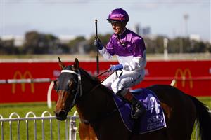 SYDNEY, AUSTRALIA - JULY 30: Kerrin McEvoy on Contributingfactor returns to scale after winning
race 3 the Midway Handicap during Sydney Racing at Rosehill Gardens on July 30, 2022 in Sydney, Australia. (Photo by Mark Evans/Getty Images)