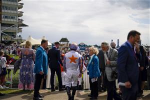 YORK, ENGLAND - AUGUST 18: Jockeys make their way to the parade ring at York Racecourse on August 18, 2022 in York, England. (Photo by Alan Crowhurst/Getty Images)
