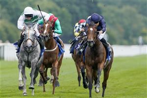 YORK, ENGLAND - AUGUST 18: Luke Morris riding Alpinista (L, white/green) win The Darley Yorkshire Oaks at York Racecourse on August 18, 2022 in York, England. (Photo by Alan Crowhurst/Getty Images)