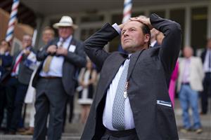 YORK, ENGLAND - AUGUST 18: Harry Dunlop watches on as his Adaay In Asia wins The British Stallion Studs EBF Fillies' Handicapat York Racecourse on August 18, 2022 in York, England. (Photo by Alan Crowhurst/Getty Images)