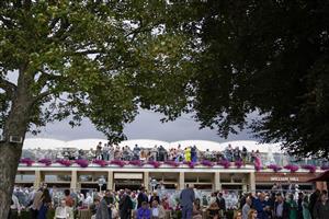 YORK, ENGLAND - AUGUST 18: Racegoer at York Racecourse on August 18, 2022 in York, England. (Photo by Alan Crowhurst/Getty Images)