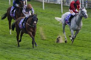 YORK, ENGLAND - AUGUST 20: Daniel Tudhope riding Summerghand (L) win The Sky Bet Constantine Handicap at York Racecourse on August 20, 2022 in York, England. (Photo by Alan Crowhurst/Getty Images)