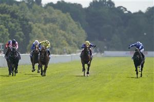 YORK, ENGLAND - AUGUST 20: Jim Crowley riding Alflaila (blue) win The Sky Bet And Symphony Group Strensall Stakes at York Racecourse on August 20, 2022 in York, England. (Photo by Alan Crowhurst/Getty Images)