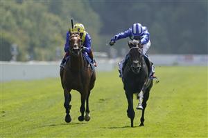 YORK, ENGLAND - AUGUST 20: Jim Crowley riding Alflaila (blue) win The Sky Bet And Symphony Group Strensall Stakes at York Racecourse on August 20, 2022 in York, England. (Photo by Alan Crowhurst/Getty Images)