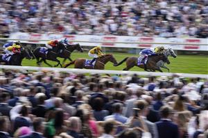 YORK, ENGLAND - AUGUST 20: Frankie Dettori riding Trawlerman (blue) win The Sky Bet Ebor Handicap from PJ McDonald riding Alfred Boucher (yellow/black) at York Racecourse on August 20, 2022 in York, England. (Photo by Alan Crowhurst/Getty Images)